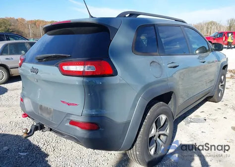 2015 Jeep Cherokee Trailhawk from USA, damaged, VIN 1C4PJMBS3FW693461